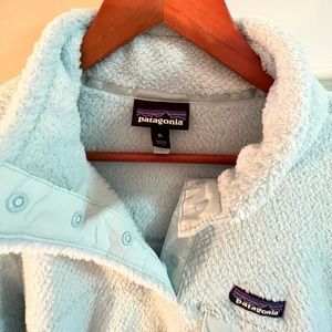 Woman’s, size XL, four snap button pull over sweater/fleece. Nice pockets!